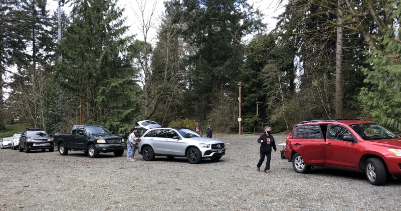 Cars line up for free trees at Spring Giveaway